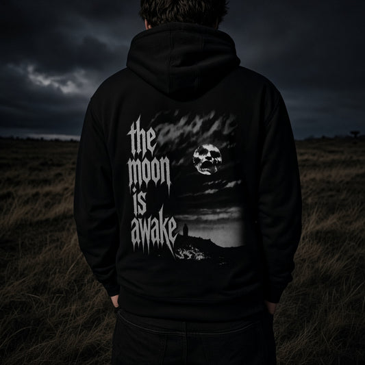 The Moon Is Awake heavyweight hoodie - full back artwork worn at night